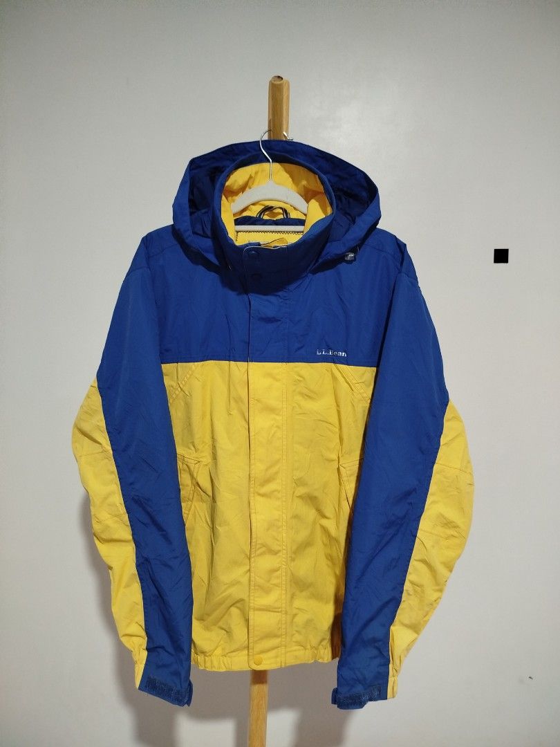 l.l.bean Colorblock Gorpcore Jacket (Category: Coats, Jackets and Outerwear) located in Aroroy. Submitted by dr0p-a-dr1p (Listing ID 1460250443, Image 1). Description: Width: 21 Length: 27 - Classic L.L.Bean colorblock jacket - Striking blue and yellow design - Features a convenient hood - Ideal for outdoor adventures and everyday casual wear - Crafted with durable, quality materials - Size Small (S) - Ready for its next journey!.