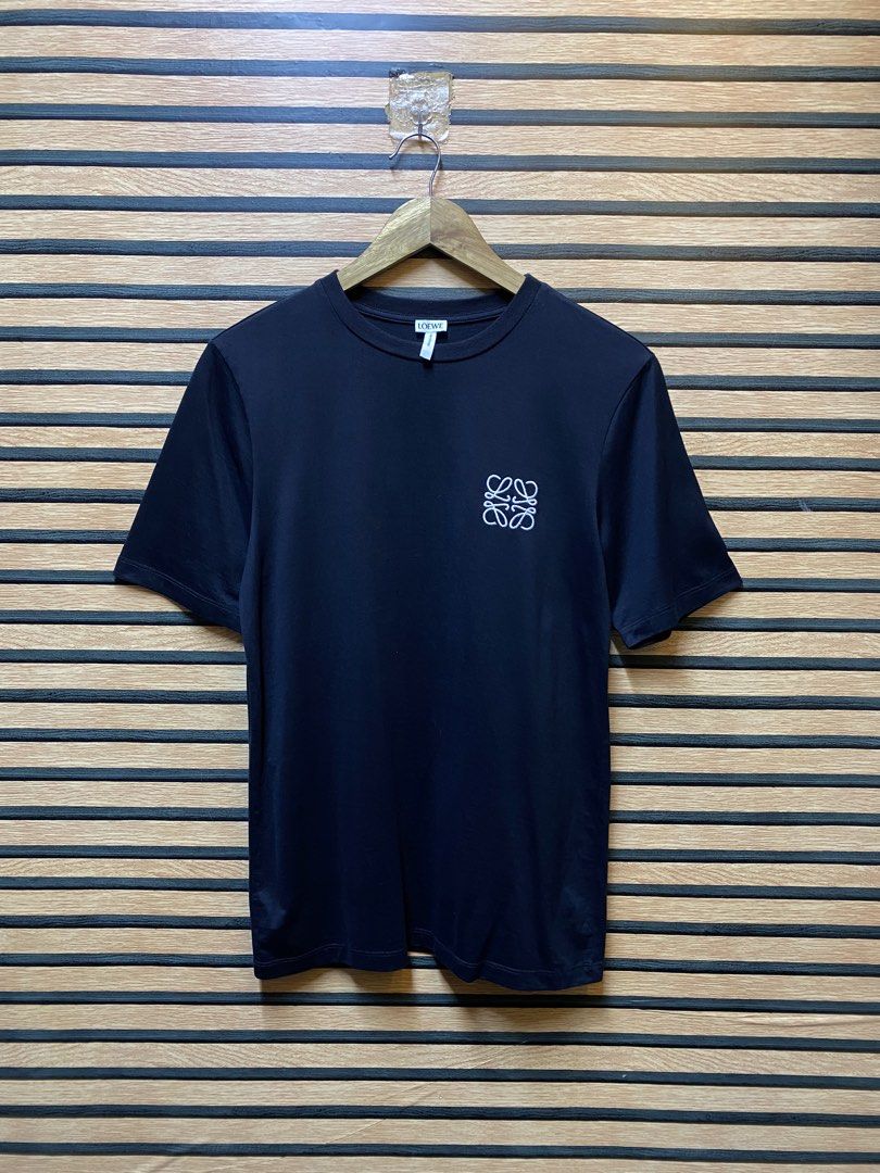 LOEWE Regular Fit Anagram (Category: Tshirts & Polo Shirts ) located in Makati City. Submitted by drip.poww (Listing ID 1460218459, Image 1). Description: - Authentic Loewe - Color: Black - Size: Small - Dimes: 19x27 - Authentic - Excellent condition - Need wash, fresh from bale - Material: 100% Cotton Please don’t expect too much—these are thrifted (ukay) items. 😊 !!STILL NEGOTIABLE!!.