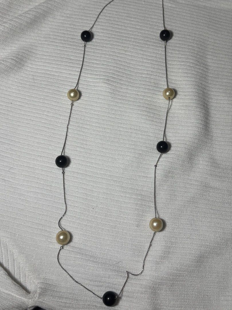 Long pearl necklace (Category: Necklaces) located in Ligao. Submitted by veetrinkets (Listing ID 1460261703, Image 1). Description: 32 inches Lobster clasp Great accessory for evening dresses.