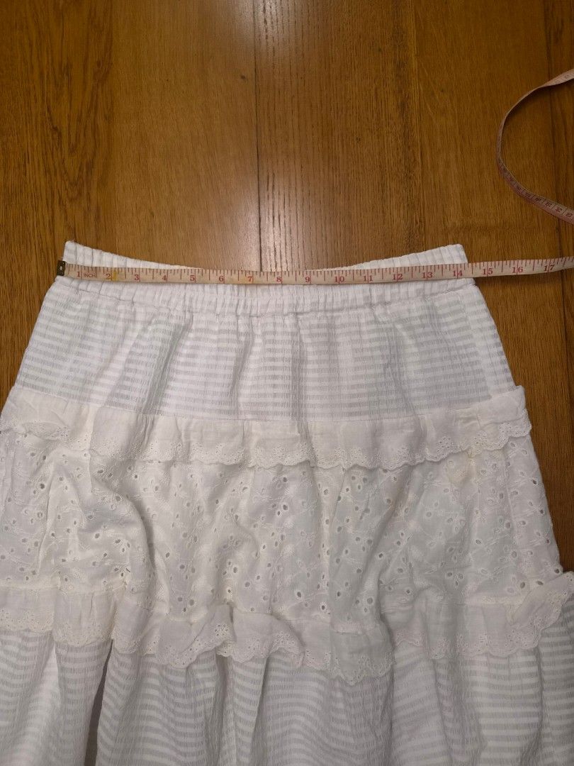 long white a-line lace ruffle skirt (Category: Skirts) located in Quezon City. Submitted by eunzaay (Listing ID 1460292064, Image 3). Description: ♡ fits s-m (waistline: 25-28inches), no ww ♡ measurements: see measuring tape in photos for reference ♡ rfs: used once ♡ has stain but washable (see 4th pic) ♡ feel free to haggle/nego!.