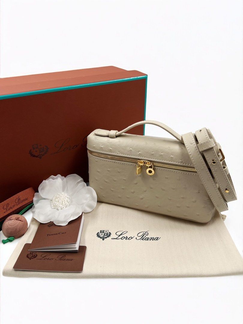 ⚜️Loro Piana - L19 bag (Category: Luxury Bags & Wallets) located in Makati City. Submitted by 90sangel (Listing ID 1371107582, Image 3). Description: •Item: L19 - The iconic Extra Pocket, — can be carried by hand or crossbody. Crafted from luxury ostrich leather ⚜️🤍in beige color 🥯🍦🍨 •Size: 11 x 19 x 6.5 cm •Condition: Gently Used, Good as New! *Negotiable (: RARE and hard to get! .