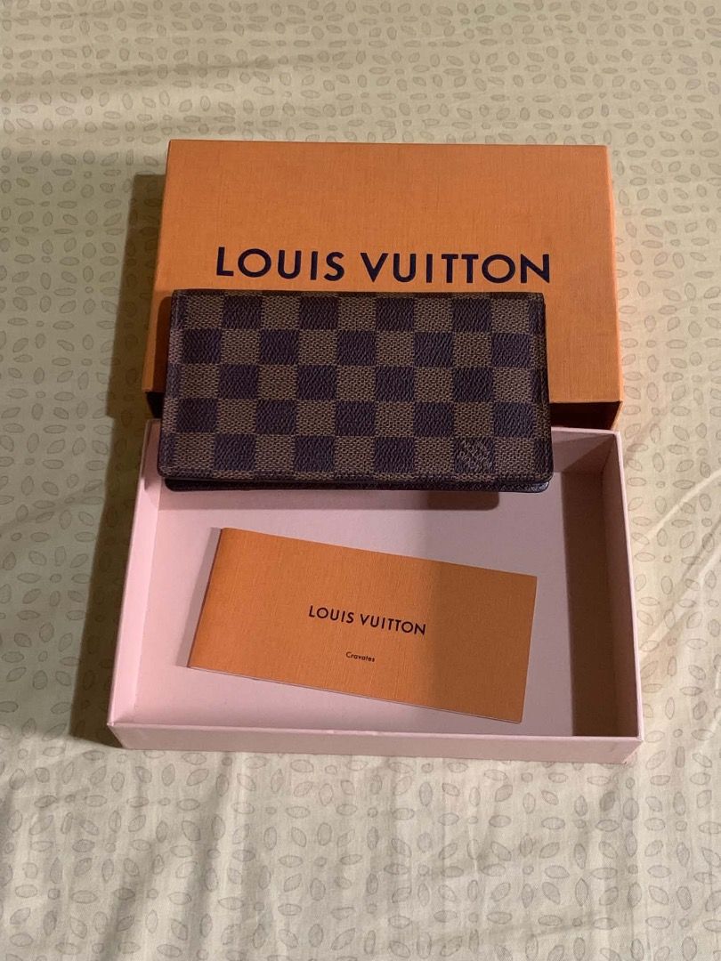 Louis Vuitton Damier Ebene Card Holder (Category: Luxury Bags & Wallets) located in Amadeo. Submitted by maricarkim (Listing ID 1460225339, Image 1). Description: - Authentic Louis Vuitton card holder - Classic Damier Ebene canvas - Multiple card slots for organization - Comes with original box, dust bag, and authenticity card - Perfect for keeping your essentials tidy.