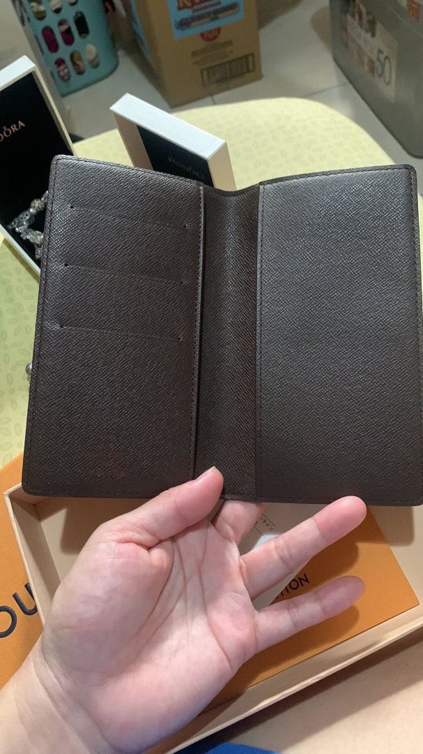 Louis Vuitton Damier Ebene Card Holder (Category: Luxury Bags & Wallets) located in Amadeo. Submitted by maricarkim (Listing ID 1460225339, Image 2). Description: - Authentic Louis Vuitton card holder - Classic Damier Ebene canvas - Multiple card slots for organization - Comes with original box, dust bag, and authenticity card - Perfect for keeping your essentials tidy.