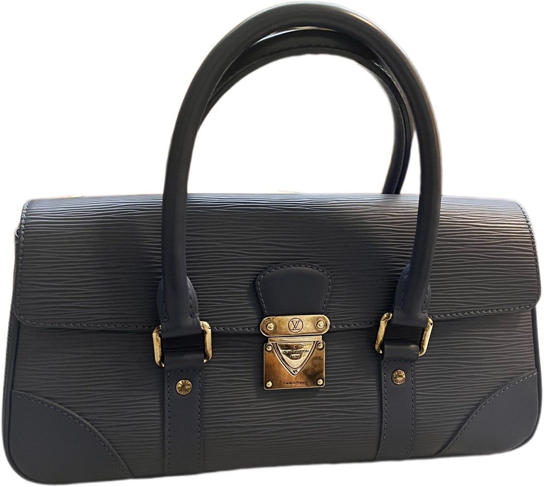 Louis Vuitton Segur Epi Leather Handbag (Category: Luxury Bags & Wallets) located in Muntinlupa City. Submitted by chiaraa400 (Listing ID 1460211023, Image 2). Description: - Classic Louis Vuitton Segur handbag in beautiful Myrtle blue Epi leather with smooth leather trim accent - Features the iconic LV lock closure. - Interior includes a convenient slip pocket. - with dust bag - Versatile for everyday use or special events. - A timeless luxury p
