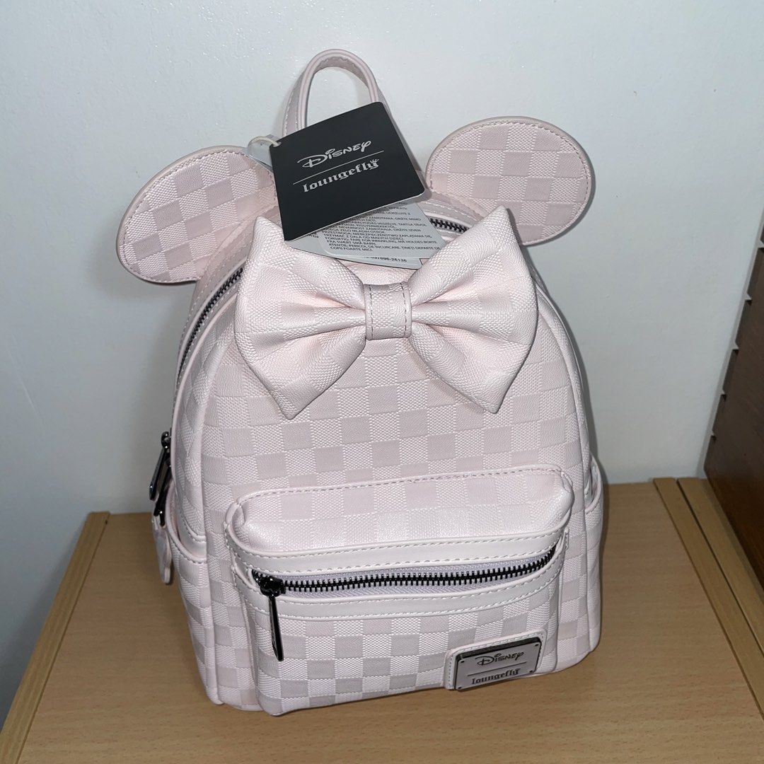 Loungefly Disney Minnie Mouse Light Pink Backpack (Category: Backpacks) located in Paranaque City. Submitted by eiiaaa (Listing ID 1460280749, Image 3). Description: Onhand! Brand new with tag. Unused. Bought at Hong Kong Disneyland last August 28, 2026. No flaws. Bought for 649HKD.