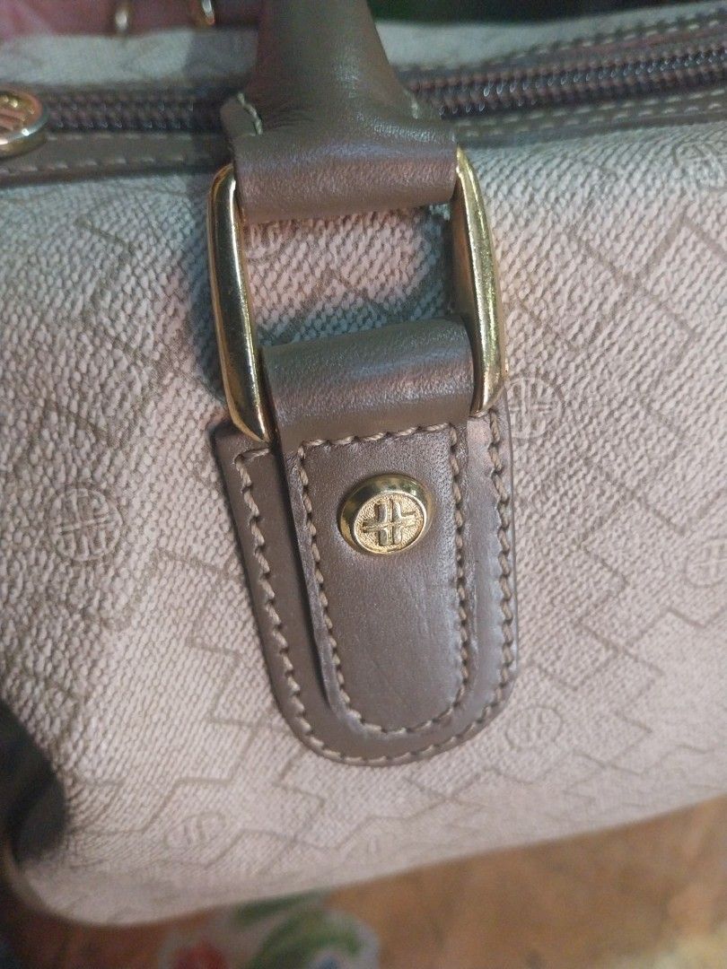 Louvier Monogram Canvas Handbag (Category: Luxury Bags & Wallets) located in Manila. Submitted by herlaniepa00965 (Listing ID 1460127290, Image 3). Description: - Louvier monogram canvas handbag - Classic design with leather trim - Elegant gold hardware - Secure zipper closure - Interior features Louvier branding - Ideal for everyday use - A chic and stylish accessory.