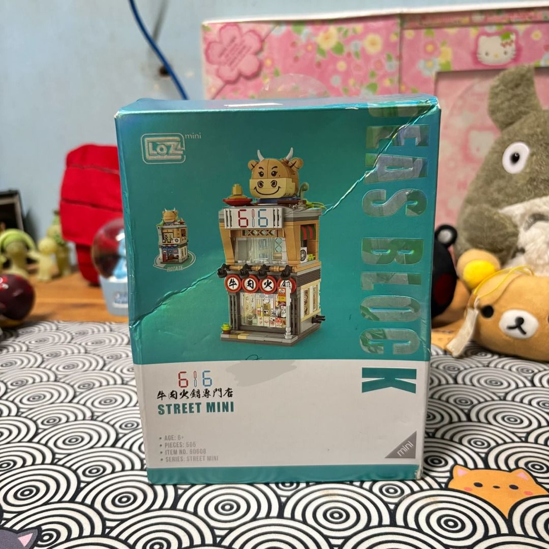 LOZ Street Mini Building Blocks (Category: Lego & Building Sets) located in Manila. Submitted by nero.ph (Listing ID 1460166856, Image 1). Description: SEALED COMPLETE - LOZ Street Mini Building Blocks Set - Adorable Cow Theme - Multiple sealed bags of pieces included - Easy-to-follow instructions provided - Ideal for collectors or as a fun DIY project - Create your own charming mini street scene.