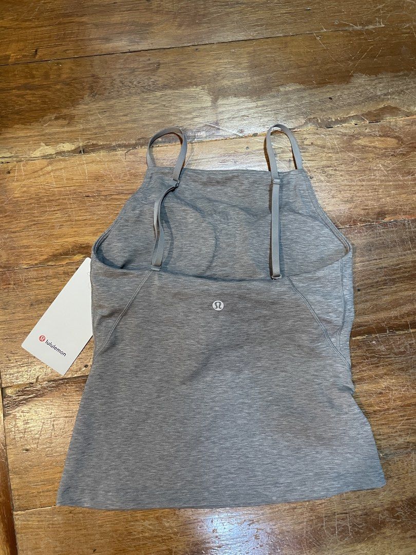 Lululemon Align High Neck Cami Tank A/B Size 4 Grey (Category: Activewear) located in Manila. Submitted by isa_m1 (Listing ID 1460239447, Image 2). Description: Lululemon Align Tank Top (see photos for when worn) - Color: Grey - Size: 4 - Style: Square high neck with adjustable straps - Condition: Brand new with original tag - RFS: bought the wrong size .