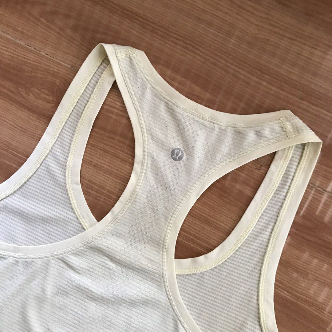 Lululemon Cream Tanktop (Category: Activewear) located in Cebu City. Submitted by whytruekoy (Listing ID 1460147955, Image 2). Description: Lululemon Cream Tanktop Authentic Dot 8 Excellent.