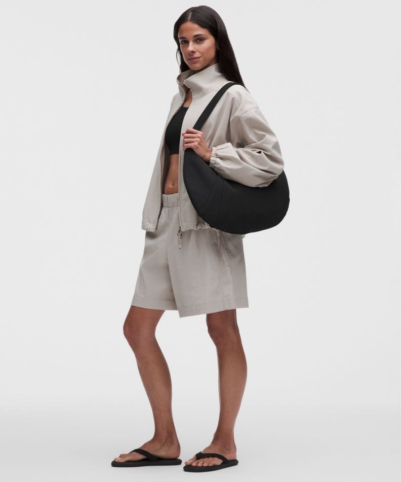 Lululemon Pleated Shoulder Bag 10L (Category: Activewear) located in Dasmarinas. Submitted by bandananowheree (Listing ID 1460254078, Image 2). Description: A perfect fit. With soft edges and a u-shaped silhouette, this shoulder bag tucks easily under your arm for a day in motion. Exterior zippered pocket with hidden phone sleeve Zippered main compartment Interior pockets to organize your small items of importance Authentic Like new condition No 