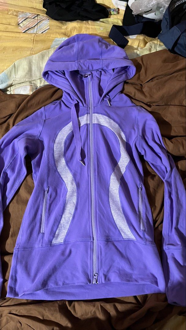 Lululemon Purple Hoodie Jacket Size 6 (Category: Coats, Jackets and Outerwear) located in Manila. Submitted by shortavenue (Listing ID 1460208132, Image 1). Description: - Bright purple Lululemon hoodie - Size 6 - Iconic Lululemon logo on front - Zippered pockets for secure storage - Drawstring hood for adjustable coverage - Ideal for workouts or casual wear.