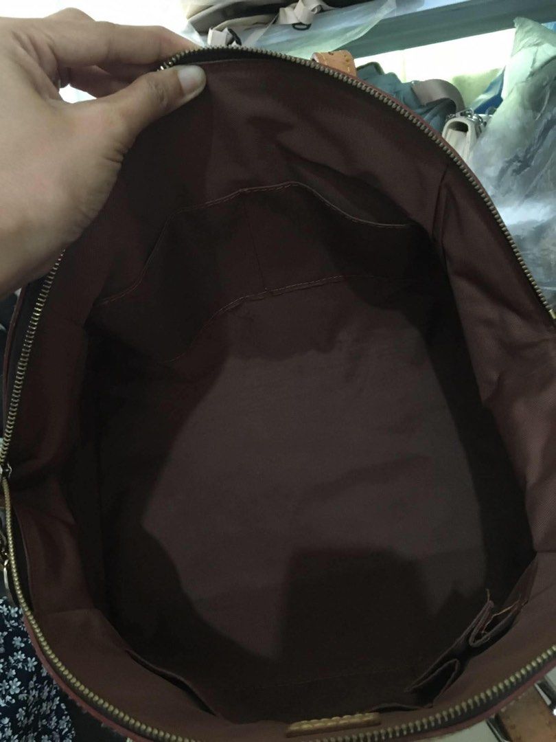 LV bag with long handle (Category: Shoulder Bags) located in Morong. Submitted by vastcat.b247ee680 (Listing ID 1460172009, Image 3). Description: Item is preloved Coded See photos for minor issue No pen mark No pipings issues.