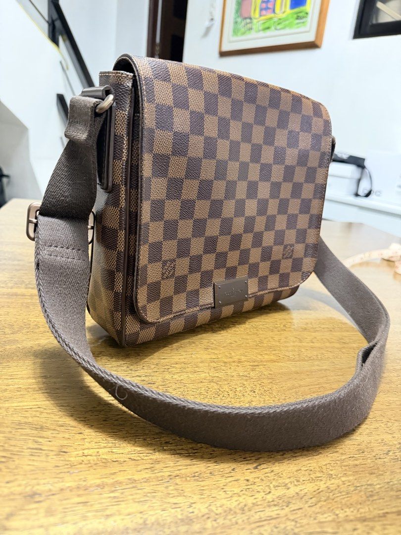 LV Damier Ebene PM Messenger Bag (Category: Luxury Bags & Wallets) located in Quezon City. Submitted by christineboller (Listing ID 1460254357, Image 2). Description: LV Damier Ebene PM Messenger Bag In 9.8/10 condition, serial no. FL1104 (Year 2014) Excellent condition, no issue. Comes with LV paperbag for Php59k. Size: 9.5 x 9 inches .