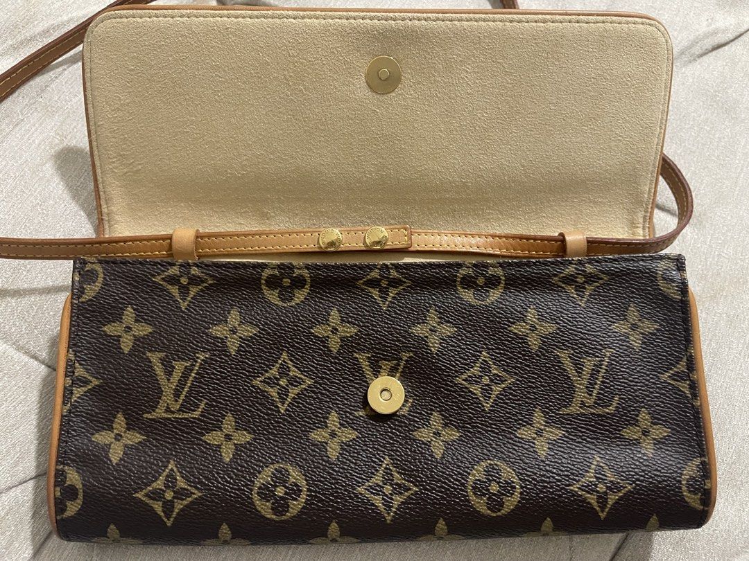 LV Pochette Twin GM (Category: Luxury Bags & Wallets) located in Manila. Submitted by sa.edit (Listing ID 1460290048, Image 3). Description: LV Pochette Twin GM Made in Spain Material: monogram canvas, vachetta leather Color: gold-tone hardware Inclusions: Leather strap, dustbag Excellent vintage condition. Clean interior. No foul smell. Multiple ways to wear! * Crossbody / Shoulder Bag: Worn at full length or doubled up for a shorter shoulder dr
