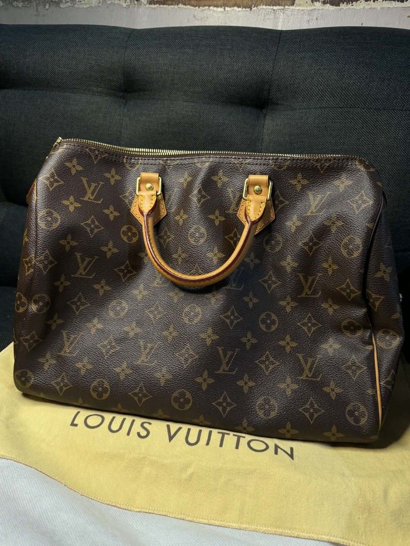 LV Speedy 35 Monogram Canvas (Category: Tote Bags) located in Quezon City. Submitted by selloutanything (Listing ID 1460193048, Image 2). Description: Louis Vuitton Speedy 35 Classic Monogram Canvas Condition 9/10 With Receipt.
