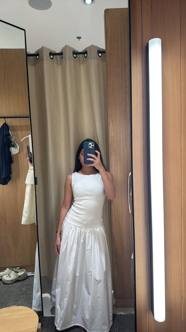 M4NGO WHITE DRESS BRANDED (Category: Dresses) located in Taguig. Submitted by jdrysssss (Listing ID 1460150358, Image 1). Description: - White sleeveless maxi dress - Flowy, gathered skirt - Versatile: great for casual outings or dressing up - Comfortable and chic - Ideal for summer days USED ONCE! BOUGHT THIS FOR 3K+.