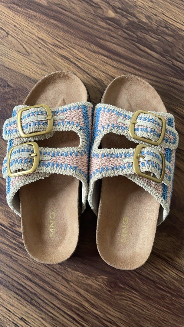 Mango Crochet Double Buckle Slides Sandals (Category: Flats & Sandals) located in Caloocan City. Submitted by chicgayle202782 (Listing ID 1460120086, Image 1). Description: - Cute crochet slides from Mango - Pastel pink and blue woven design - Features gold buckles - Comfortable cork footbed - Easy slip-on style - Perfect for summer days out (too small lang sakin) anjan pa po ung tag price.