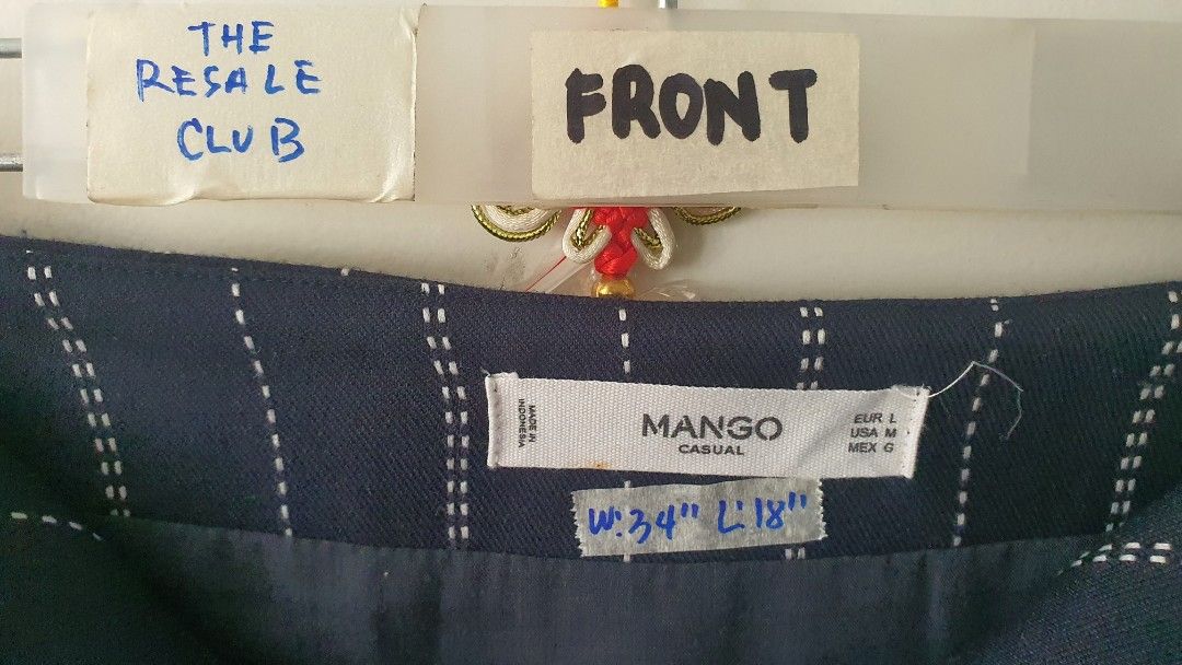 Mango Navy Pinstripe Button-Front Mini Skirt Size L (Category: Skirts) located in Tarlac. Submitted by resaleclub (Listing ID 1460148199, Image 2). Description: - Brand: Mango - Color: Navy Blue - Style: Mini Skirt - Pattern: Pinstripe - Closure: Button-front - Size: L - Waist: Approx. 34 inches - Length: Approx. 18 inches - Occasion: Casual Wear.