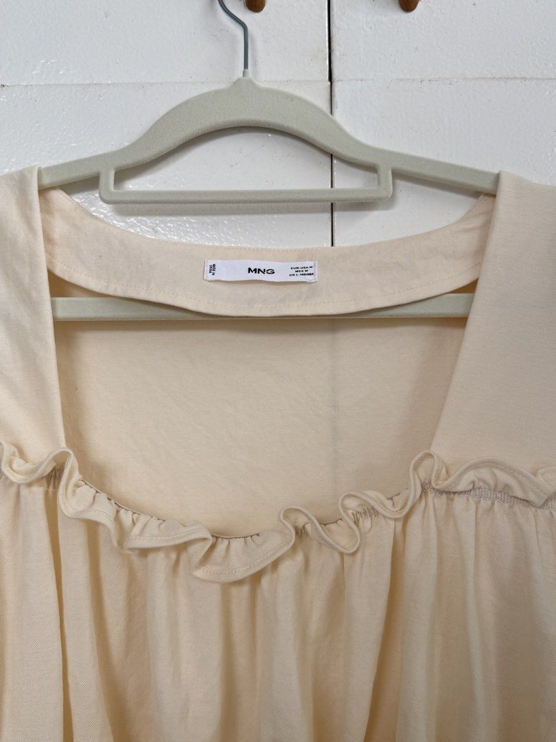 Mango Peplum Blouse (Category: Blouses) located in Paranaque City. Submitted by marjdom23__ (Listing ID 1460146340, Image 3). Description: • Worn once but has been stored for quite some time • Has a minor stain that’s unnoticeable • RFS: No longer my style, decluttering .