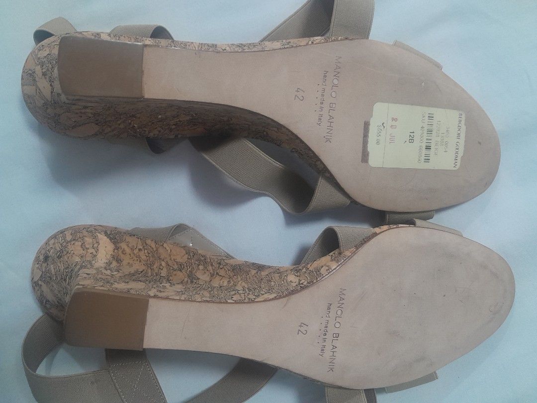 Manolo Blahnik Cork Wedge Sandals (Category: Heels) located in Manila. Submitted by glengpascu18784 (Listing ID 1460212335, Image 2). Description: - Authentic Manolo Blahnik wedge sandals - Made in Italy - Cork sole with elastic straps - Size: 42 - Brand new with original tag attached - Original price: $555.00 - Ideal for summer wear.