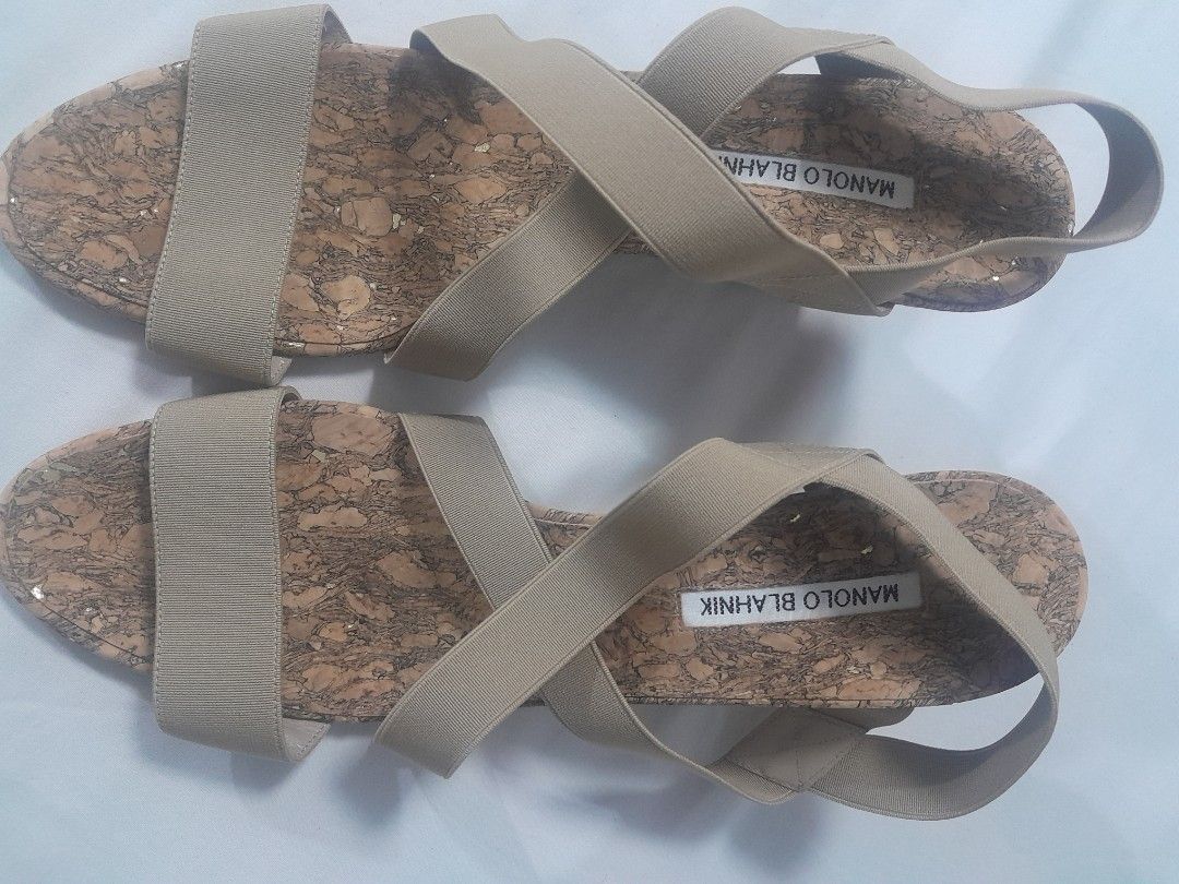 Manolo Blahnik Cork Wedge Sandals (Category: Heels) located in Manila. Submitted by glengpascu18784 (Listing ID 1460212335, Image 1). Description: - Authentic Manolo Blahnik wedge sandals - Made in Italy - Cork sole with elastic straps - Size: 42 - Brand new with original tag attached - Original price: $555.00 - Ideal for summer wear.
