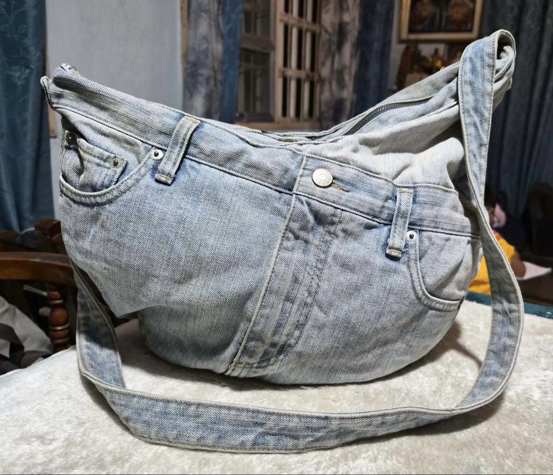 Marc by Marc Jacobs Denim Crossbody Bag (Category: Luxury Bags & Wallets) located in Mandaue City. Submitted by chuchi152615 (Listing ID 1460284239, Image 1). Description: - Unique crossbody bag crafted from actual denim jeans. - Features original jean pockets and belt loops for authentic style. - Secure zipper closure to keep your belongings safe. - Adjustable strap for a comfortable, customized fit. - Perfect for everyday use, adding a stylish 