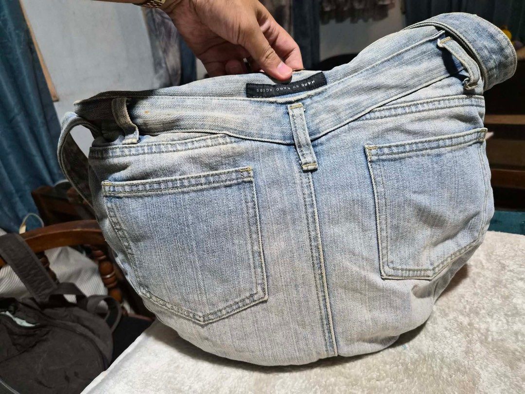 Marc by Marc Jacobs Denim Crossbody Bag (Category: Luxury Bags & Wallets) located in Mandaue City. Submitted by chuchi152615 (Listing ID 1460284239, Image 3). Description: - Unique crossbody bag crafted from actual denim jeans. - Features original jean pockets and belt loops for authentic style. - Secure zipper closure to keep your belongings safe. - Adjustable strap for a comfortable, customized fit. - Perfect for everyday use, adding a stylish 