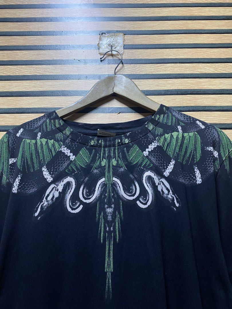 Marcelo Burlon Moa Tee (Category: Tshirts & Polo Shirts ) located in Makati City. Submitted by drip.poww (Listing ID 1460236342, Image 3). Description: - Authentic Marcelo Burlon - Color: Black - Size: Large - Dimes: 23x30 - Authentic - Excellent condition - Need wash, fresh from bale - Material: 100% Cotton Please don’t expect too much—these are thrifted (ukay) items. 😊 !!STILL NEGOTIABLE!!.