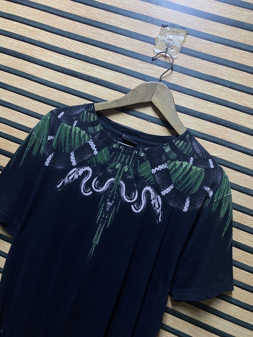 Marcelo Burlon Moa Tee (Category: Tshirts & Polo Shirts ) located in Makati City. Submitted by drip.poww (Listing ID 1460236342, Image 2). Description: - Authentic Marcelo Burlon - Color: Black - Size: Large - Dimes: 23x30 - Authentic - Excellent condition - Need wash, fresh from bale - Material: 100% Cotton Please don’t expect too much—these are thrifted (ukay) items. 😊 !!STILL NEGOTIABLE!!.