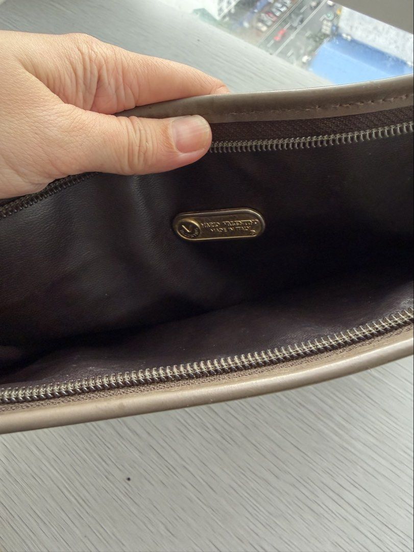 Mario Valentino brown monogram clutch bag (Category: Belt bags, Clutches and Pouches) located in Quezon City. Submitted by shopgood_mnl (Listing ID 1460264143, Image 3). Description: .