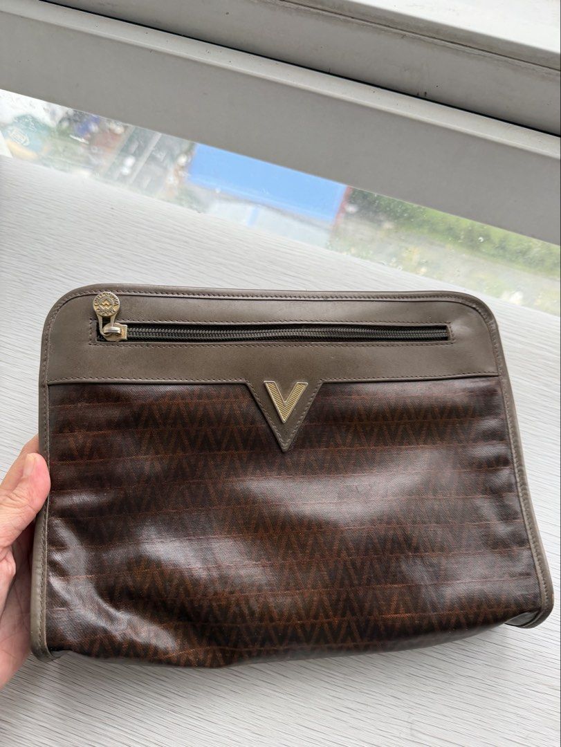 Mario Valentino brown monogram clutch bag (Category: Belt bags, Clutches and Pouches) located in Quezon City. Submitted by shopgood_mnl (Listing ID 1460264143, Image 1). Description: .