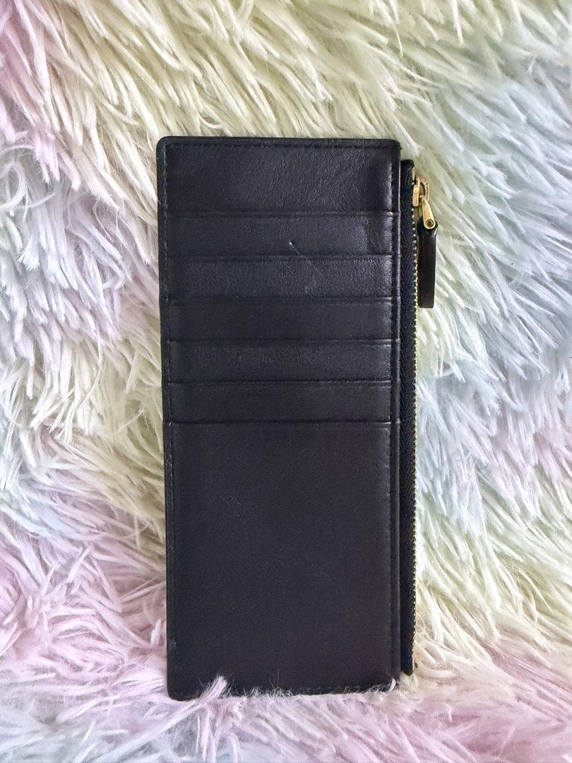 MCM Long Card Holder / Insert Wallet — Black Leather (Category: Luxury Bags & Wallets) located in Rizal. Submitted by affordabagz (Listing ID 1460261604, Image 2). Description: 📌 Item Details: • Brand: MCM München — embossed logo on smooth black leather • Type: Long Card Holder / Zip Insert Wallet — slim design, 6 card slots + full-length zip compartment at the back • Zipper: Gold-tone hardware, marked 3Y (authentic MCM zipper code — YKK/Lampo v