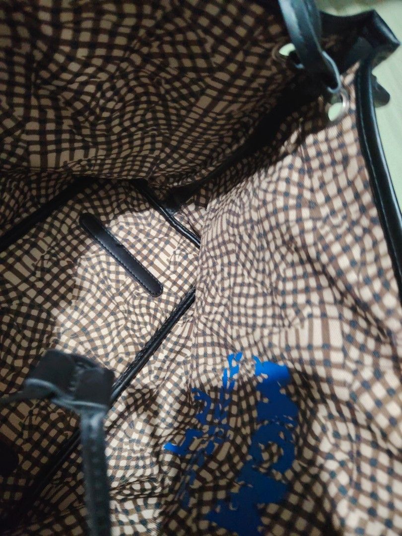 MCM Monogram Tote Bag (Category: Luxury Bags & Wallets) located in Santa Rosa. Submitted by RRRR0520 (Listing ID 1460304624, Image 3). Description: - Classic MCM tote bag - All-over MCM monogram pattern - Black leather trim and straps - Interior features checkered lining - Spacious main compartment WHAT U C S WHAT U GET PLEASE CHECK PHOTOS SIGN OF USED .