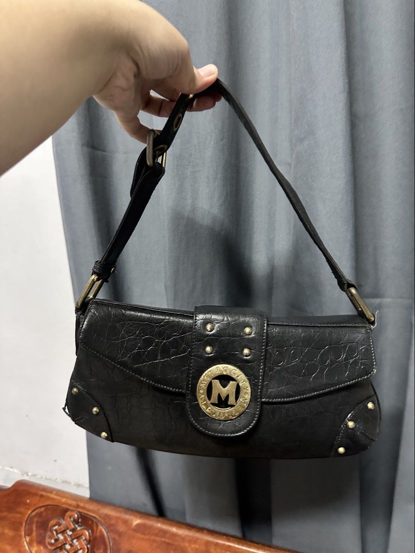 Metro City Kili Bag (Category: Shoulder Bags) located in Navotas City. Submitted by png_ay (Listing ID 1460272148, Image 1). Description: Original Metro City Bag - with issue due to usage pero di naman kita kapag soot - hardware fade and a little sa breakage sa gilid - Actual Photo posted - Decluttering .