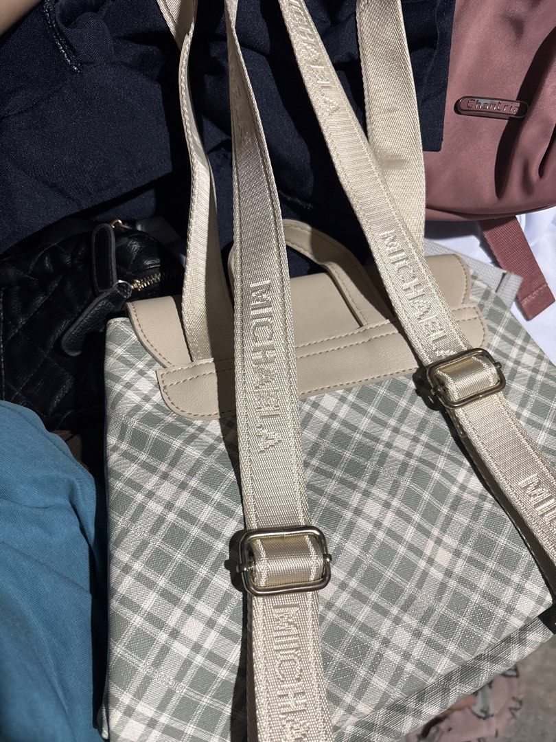 Michaela Plaid Small Backpack (Category: Backpacks) located in Taguig. Submitted by .akate (Listing ID 1460233882, Image 3). Description: like new hardware is slightly tarnished other flaw is the cat scratch in front of the bag 🥲 rfs : declutter.