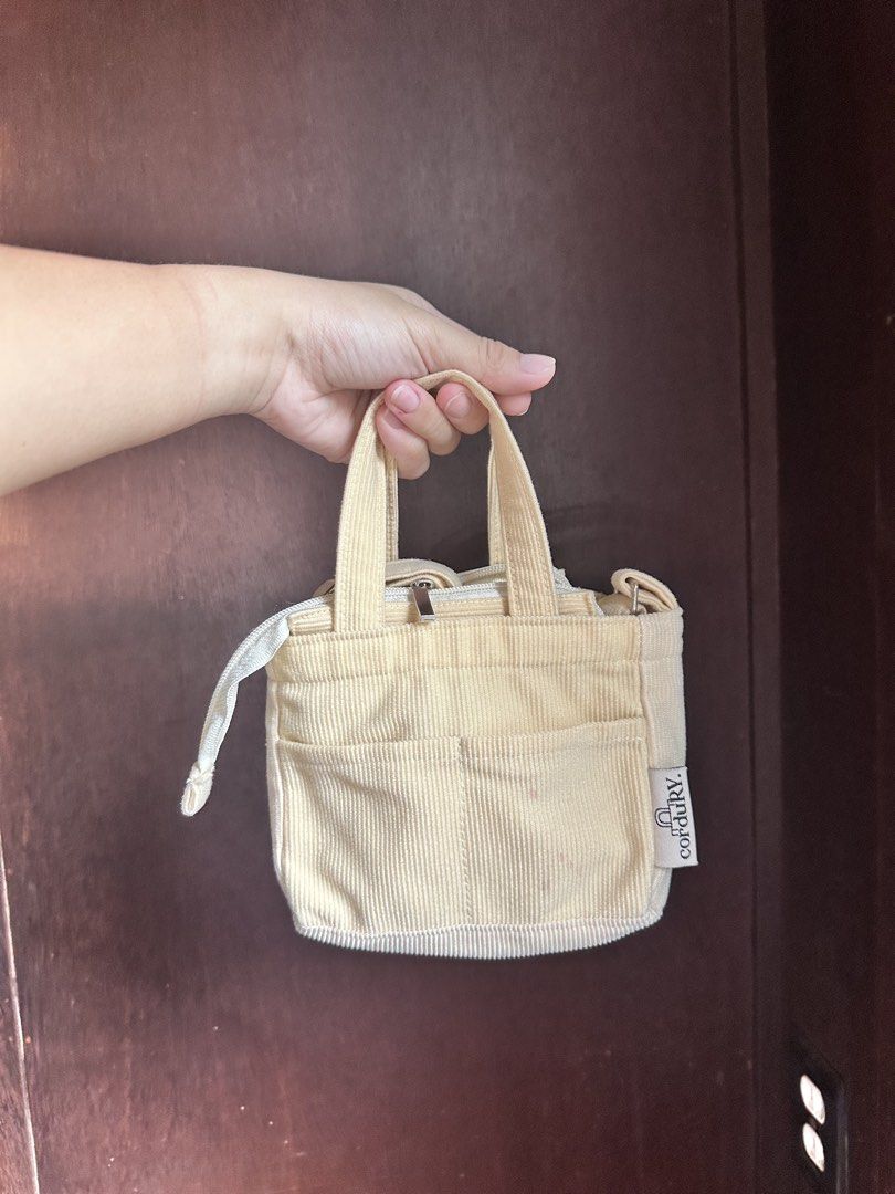 Micro Sling Bag - Cream (Category: Cross-body Bags) located in Makati City. Submitted by prelovednialice (Listing ID 1460158335, Image 1). Description: Cream micro-sling bag. Fits small wallet and phone. 8/10 condition - working zipper.