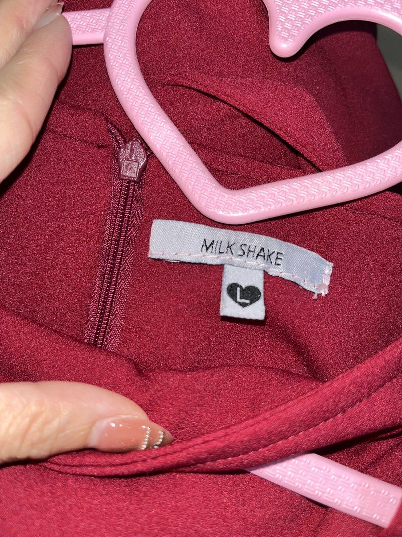 Milk Shake Burgundy Jumpsuit (Category: Jumpsuits) located in Santa Rosa. Submitted by angee18 (Listing ID 1460189731, Image 2). Description: - Burgundy jumpsuit from Milk Shake - Includes a belt with a buckle - Wide leg pants for a flattering silhouette - Zipper closure at the back for easy wear - Versatile piece: dress it up or down! - Large on tag but altered ( FITS XS-SMALL) .