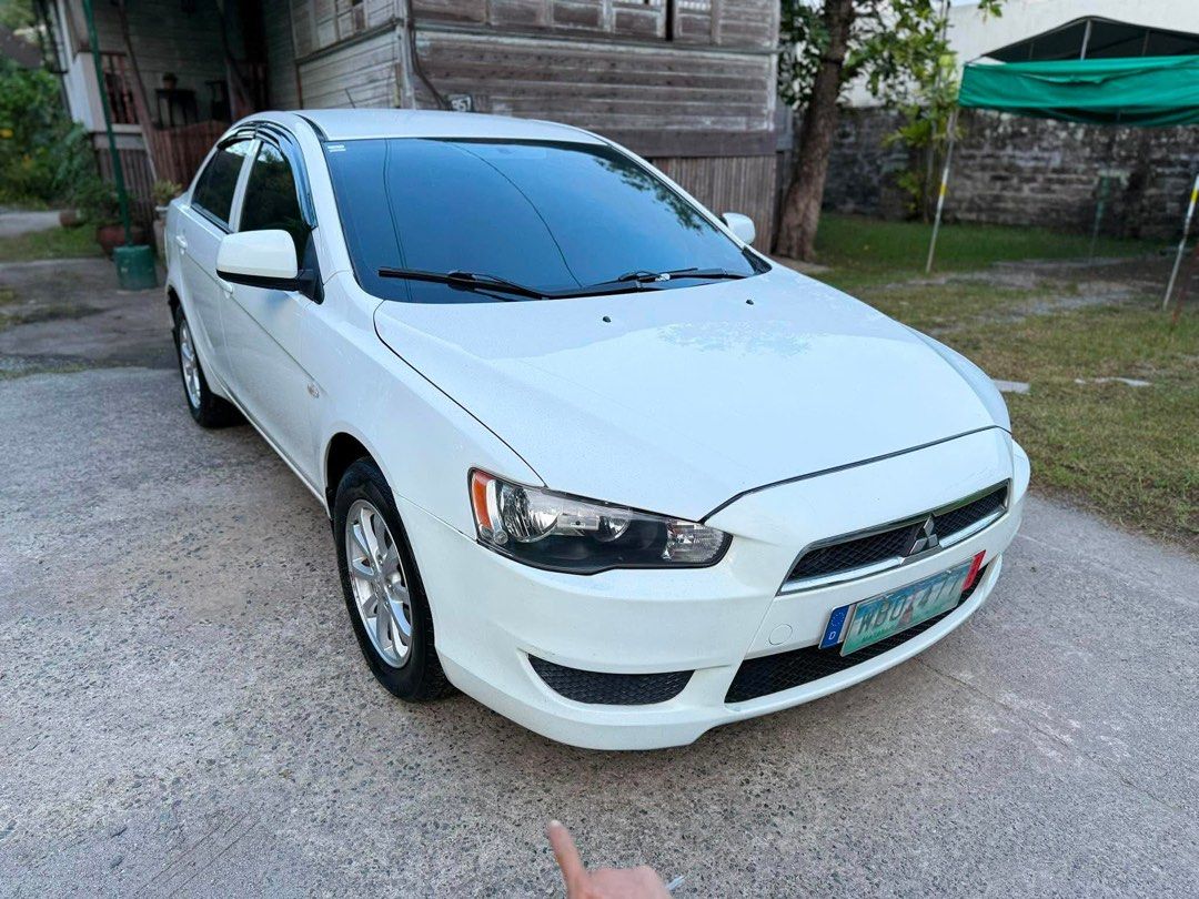 Mitsubishi Lancer 1.6 EX GLX Manual (Category: Used Cars) located in Bulacan. Submitted by jrl1101 (Listing ID 1460113828, Image 2). Description: For sale: Mitsubishi Lancer EX GLX 2013 Manual transmission Registered 89+++ original mileage First owner Bosch europa installed Newly bought amaron battery Nothing to fix Fresh unit Gas and Go P330,000 Slightly negotiable Plus na lang sa agent Cash and financing accepted Loc: Malolos, Bulacan Pm of int