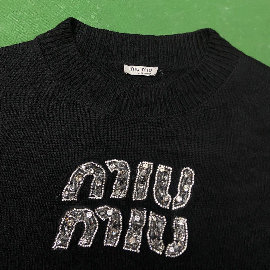Miu miu (Category: Luxury Apparel) located in Cabatuan. Submitted by moneydimes (Listing ID 1460277024, Image 2). Description: 16 x 20 no flaws Like new.