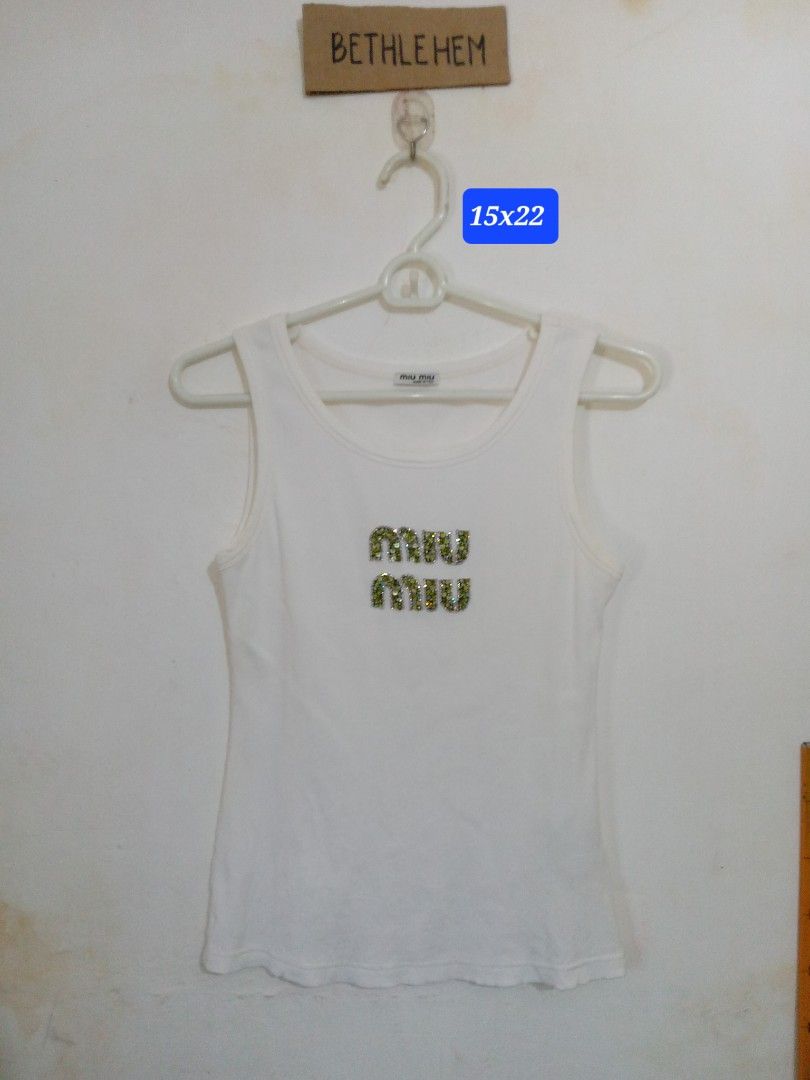 Miu miu tanktop (Category: Shirts) located in Akbar. Submitted by bethlehema07352 (Listing ID 1460138722, Image 1). Description: .