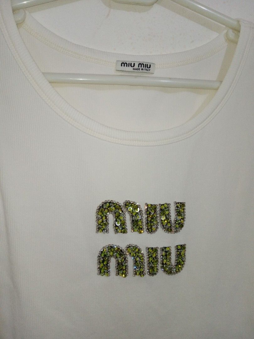 Miu miu tanktop (Category: Shirts) located in Akbar. Submitted by bethlehema07352 (Listing ID 1460138722, Image 2). Description: .