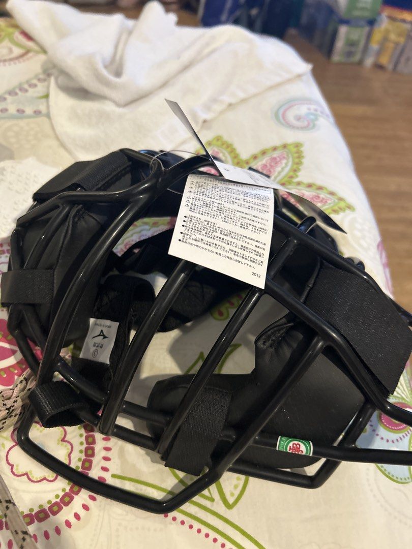 Mizuno Baseball Catcher's Mask - Black (Category: Racket and Ball Sports) located in Manila. Submitted by jeanvdg (Listing ID 1460216843, Image 1). Description: - Mizuno Catcher's Mask - Color: Black - Origin: Made in Vietnam - Bought in Japan - Model Number: 1DJQR11009 - Perfect for baseball catchers.
