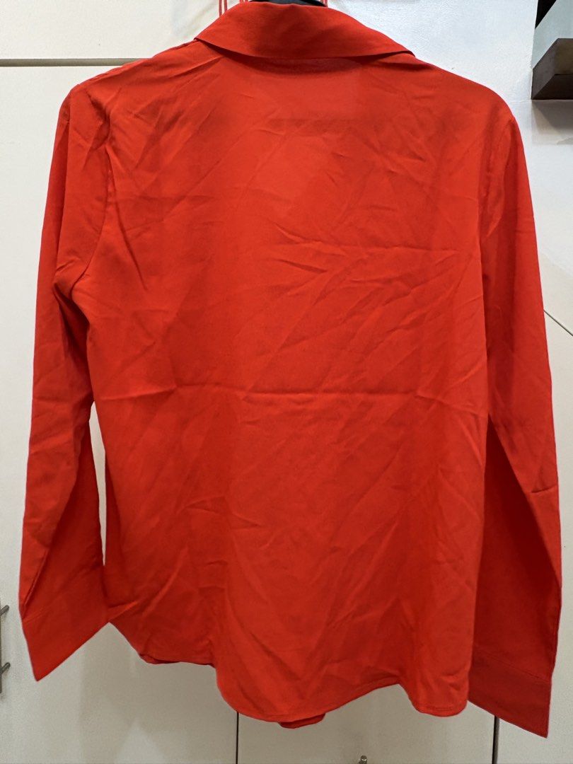MNG by Mango Orange Button-Down Blouse (Category: Others Tops) located in Paranaque City. Submitted by yanionlineshopping (Listing ID 1460233507, Image 2). Description: MNG by Mango Orange Button-Down Blouse Size XS / US 2 Long sleeves • Classic collared style Great for office or smart-casual wear.