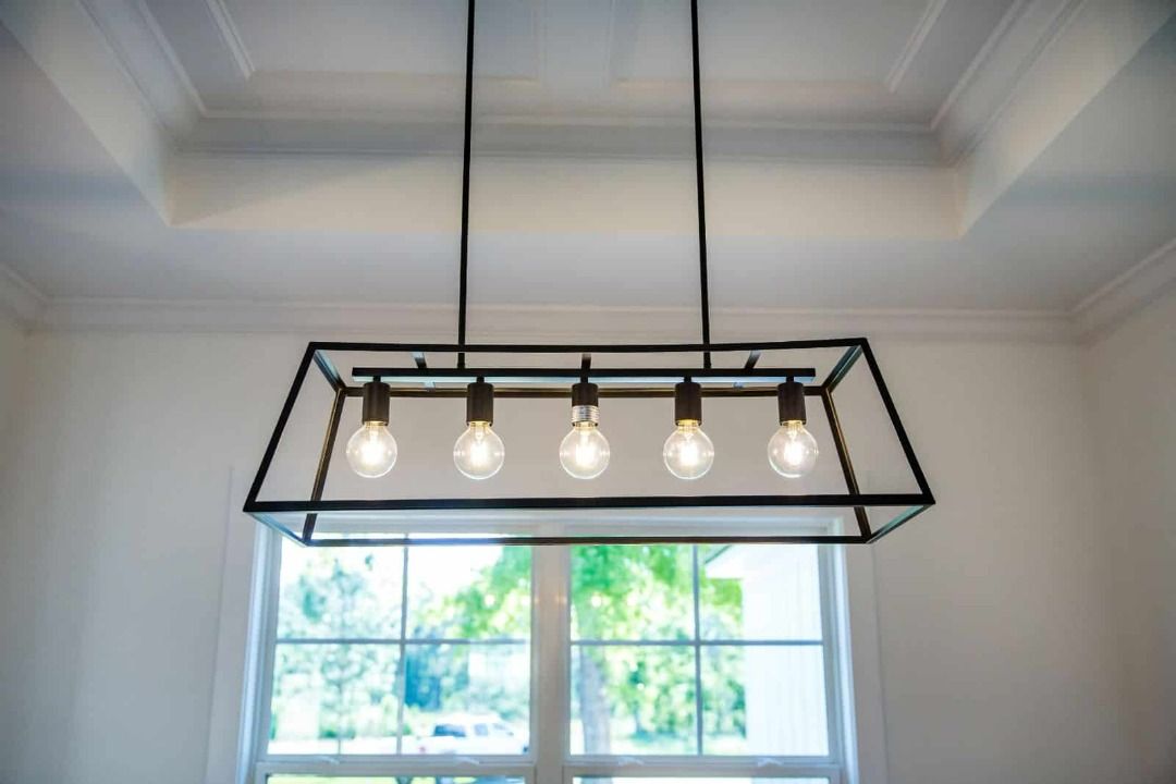 Modern Chandelier (Pendant Chandelier) (Category: Lighting) located in Caloocan City. Submitted by eleven.thirty (Listing ID 1460164286, Image 1). Description: 4-Light Black Island Light -Modern Industrial Chandelier - Modern chandelier with a sleek black metal frame. - Unique geometric design (31inx 12in x 28in). - Perfect for dining rooms, living rooms, or entryways. - Adds a stylish and sophisticated touch to your home decor. -New bulbs includ