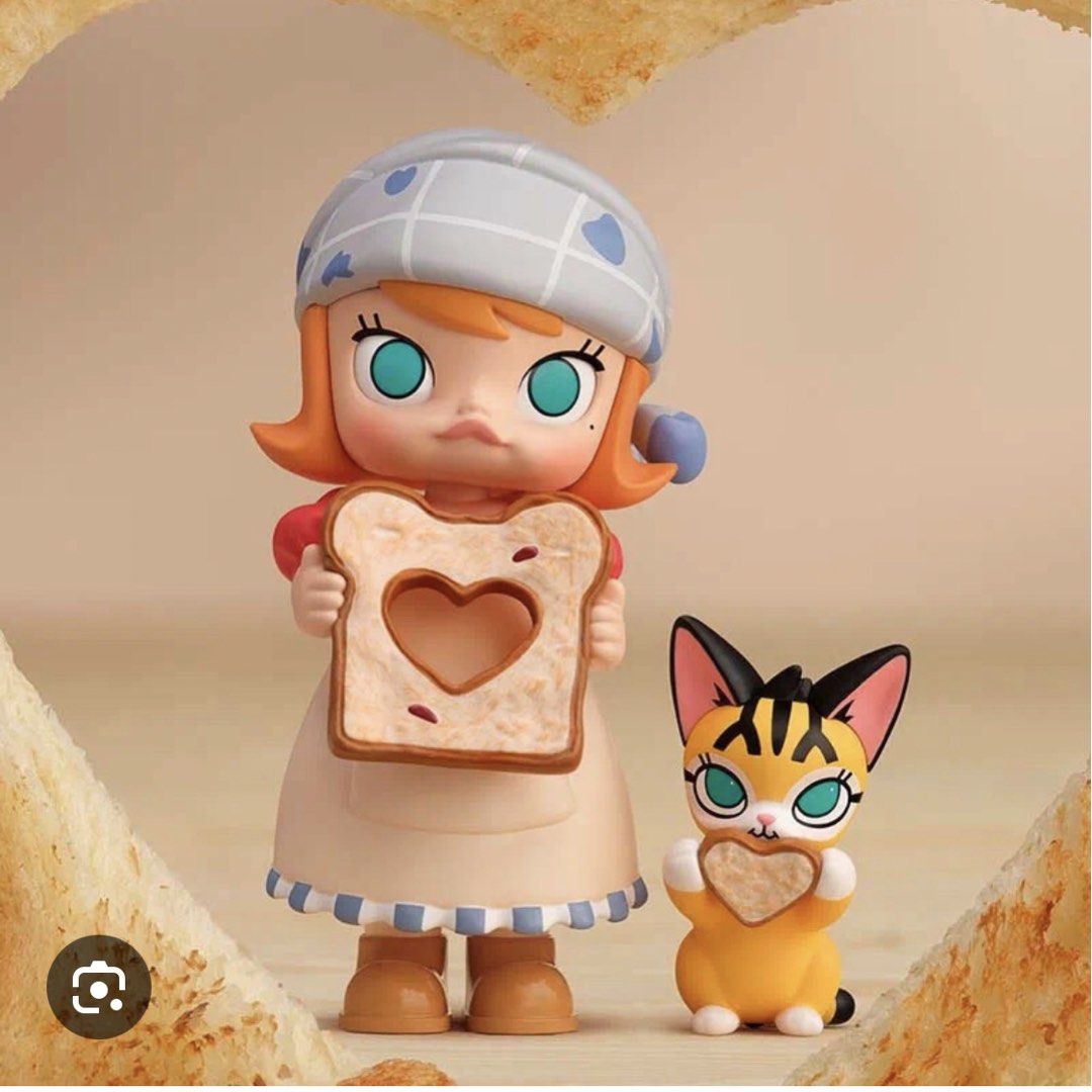 Molly Pop Mart Figure with Cat (Category: Designer & Blind Box Toys) located in Mandaluyong City. Submitted by chimbashey (Listing ID 1460150643, Image 1). Description: - Adorable Molly figure with her cat companion. - Features them holding toast with cute heart cutouts. - Comes in its original, clear packaging. - Ideal for collectors or as a thoughtful gift. - Adds a fun and charming touch to any display..