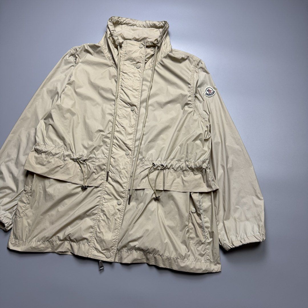 Moncler - Beige Light Weight Waist String Zip up Jacket (Category: Luxury Apparel) located in Quezon City. Submitted by japon_rose (Listing ID 1460173862, Image 3). Description: READ DESCRIPTION FIRST BEFORE YOU START A DEAL Please do self authenticate all photos are been posted Womens/ Moncler - Beige Light Weight Waist String Zip up Jacket Color: Beige Size: 2 on tag (Womens) Length: 26 Width: 21 Shoulder: 16 Sleeves: 22 Hem: 22.5 (MEASURED IT 