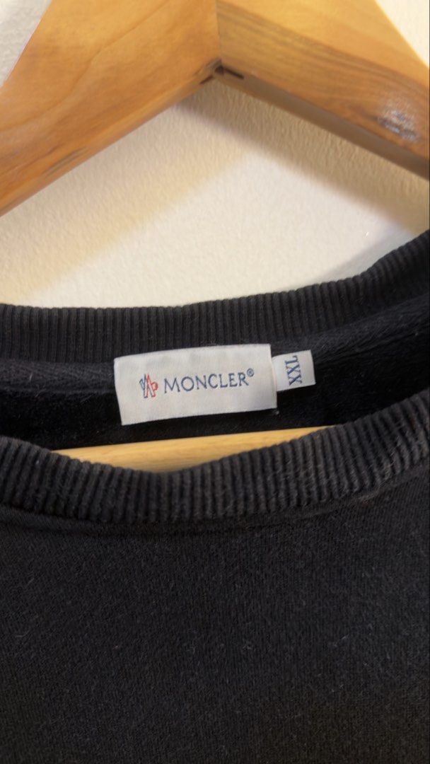 Moncler Black Logo Sweatshirt XXL (Category: Coats, Jackets and Outerwear) located in Paranaque City. Submitted by mykapoynton (Listing ID 1460293381, Image 3). Description: Moncler Black Logo Sweatshirt XXL - Color: Black - Size: XXL - Iconic embroidered Moncler logo on chest - Made in China - Ideal for casual wear.