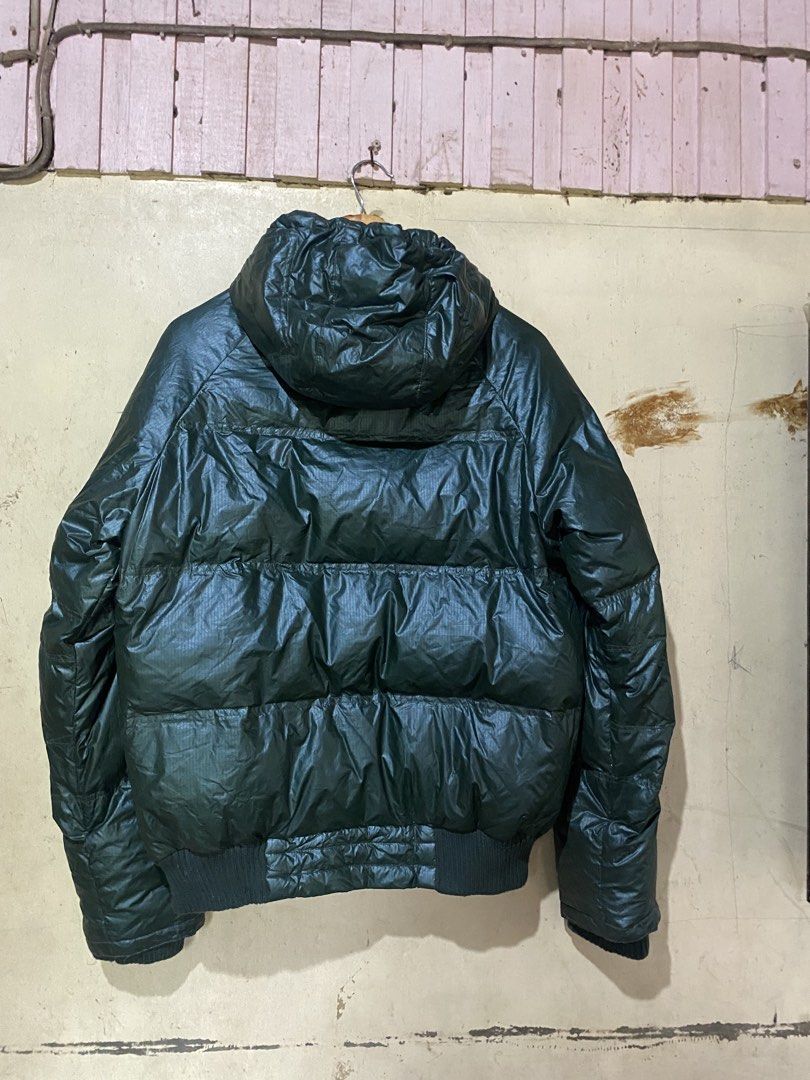Moncler Down Puffer Jacket Size 50 Green Hooded (Category: Coats, Jackets and Outerwear) located in Manaoag. Submitted by jericsapigao (Listing ID 1460260637, Image 2). Description: - Green Moncler puffer jacket - Size 50 - 100% down filling for ultimate warmth - 100% polyamide lining - Attached hood - Convenient zip pockets - Features unique comic strip care instructions inside - Ideal for cold weather conditions.
