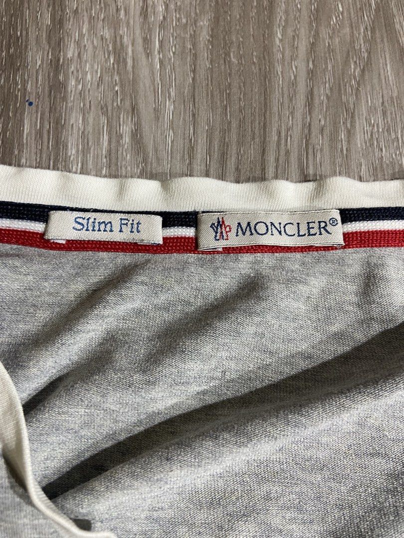 Moncler V-Neck Stretch Cotton Grey (Category: Tshirts & Polo Shirts ) located in Cebu City. Submitted by jvlz97 (Listing ID 1460125654, Image 3). Description: Very Good Condition Sign of usage barely Visible Pinhole that can be seen on the last photo Dimes W21" L 29".