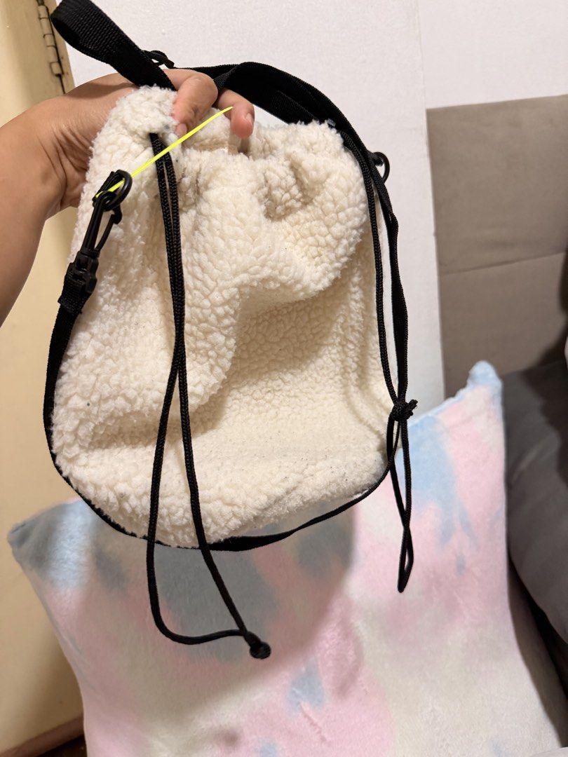 Moomin cream-colored faux-shearling drawstring bag (Category: Cross-body Bags) located in Quezon City. Submitted by cookiecreammm (Listing ID 1460284361, Image 3). Description: .